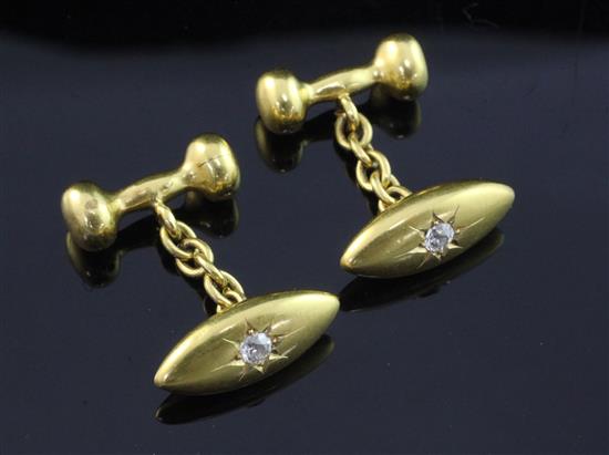 A pair of early 20th century 18ct gold and diamond set torpedo shaped cufflinks, gross weight 9.4 grams.